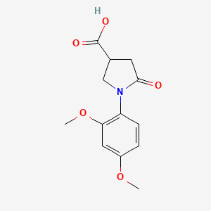 molecular formula C13H15NO5 B2860950 1-(2,4-Dimethoxyphenyl)-5-oxopyrrolidine-3-carboxylic acid CAS No. 133749-24-3