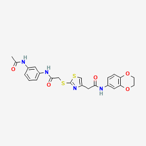 molecular formula C23H22N4O5S2 B2861293 2-[(4-{[(2,3-dihydro-1,4-benzodioxin-6-yl)carbamoyl]methyl}-1,3-thiazol-2-yl)sulfanyl]-N-(3-acetamidophenyl)acetamide CAS No. 953984-67-3