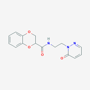 molecular formula C15H15N3O4 B2861787 N-(2-(6-氧代哒嗪-1(6H)-基)乙基)-2,3-二氢苯并[b][1,4]二噁英-2-甲酰胺 CAS No. 1210206-95-3