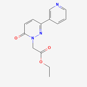 molecular formula C13H13N3O3 B2862102 Ethyl 2-(6-oxo-3-pyridin-3-ylpyridazin-1-yl)acetate CAS No. 2379993-34-5