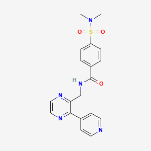 molecular formula C19H19N5O3S B2863864 4-(二甲基磺酰氨基)-N-{[3-(吡啶-4-基)吡嗪-2-基]甲基}苯甲酰胺 CAS No. 2097909-06-1