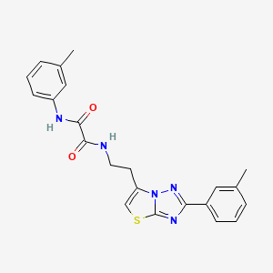 molecular formula C22H21N5O2S B2863928 N1-(m-tolyl)-N2-(2-(2-(m-tolyl)thiazolo[3,2-b][1,2,4]triazol-6-yl)ethyl)oxalamide CAS No. 894039-31-7