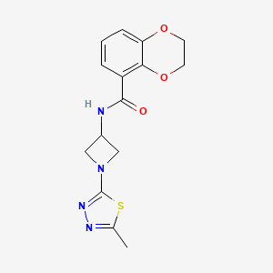 molecular formula C15H16N4O3S B2864028 N-[1-(5-Methyl-1,3,4-thiadiazol-2-yl)azetidin-3-yl]-2,3-dihydro-1,4-benzodioxine-5-carboxamide CAS No. 2415519-82-1
