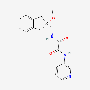 molecular formula C18H19N3O3 B2864484 N1-((2-methoxy-2,3-dihydro-1H-inden-2-yl)methyl)-N2-(pyridin-3-yl)oxalamide CAS No. 2034261-90-8