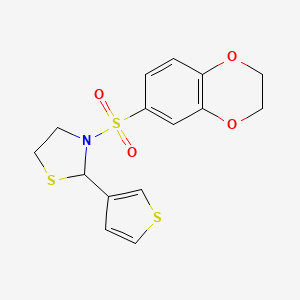 molecular formula C15H15NO4S3 B2864738 3-((2,3-Dihydrobenzo[b][1,4]dioxin-6-yl)sulfonyl)-2-(thiophen-3-yl)thiazolidine CAS No. 2034471-65-1