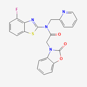 N-(4-fluoro-1,3-benzothiazol-2-yl)-2-(2-oxo-2,3-dihydro-1,3-benzoxazol-3-yl)-N-[(pyridin-2-yl)methyl]acetamide