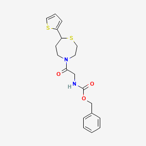 molecular formula C19H22N2O3S2 B2865832 Benzyl (2-oxo-2-(7-(thiophen-2-yl)-1,4-thiazepan-4-yl)ethyl)carbamate CAS No. 1705218-43-4