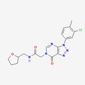 2-(3-(3-chloro-4-methylphenyl)-7-oxo-3H-[1,2,3]triazolo[4,5-d]pyrimidin-6(7H)-yl)-N-((tetrahydrofuran-2-yl)methyl)acetamide