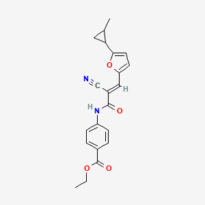 molecular formula C21H20N2O4 B2866504 (E)-ethyl 4-(2-cyano-3-(5-(2-methylcyclopropyl)furan-2-yl)acrylamido)benzoate CAS No. 488107-42-2