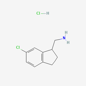 molecular formula C10H13Cl2N B2866546 (6-Chloro-2,3-dihydro-1H-inden-1-yl)methanamine hydrochloride CAS No. 1890354-26-3