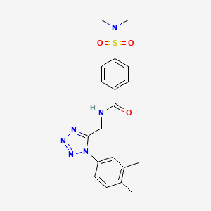 molecular formula C19H22N6O3S B2868115 N-[[1-(3,4-二甲苯基)四唑-5-基]甲基]-4-(二甲基氨磺酰)苯甲酰胺 CAS No. 897622-63-8