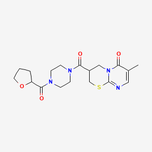 molecular formula C18H24N4O4S B2868651 7-methyl-3-(4-(tetrahydrofuran-2-carbonyl)piperazine-1-carbonyl)-3,4-dihydropyrimido[2,1-b][1,3]thiazin-6(2H)-one CAS No. 1396860-80-2