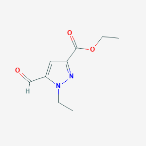 molecular formula C9H12N2O3 B2869353 ethyl 1-ethyl-5-formyl-1H-pyrazole-3-carboxylate CAS No. 1823789-80-5