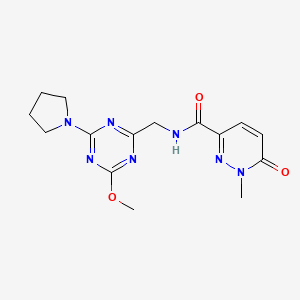 molecular formula C15H19N7O3 B2869850 N-((4-甲氧基-6-(吡咯烷-1-基)-1,3,5-三嗪-2-基)甲基)-1-甲基-6-氧代-1,6-二氢吡啶嗪-3-甲酰胺 CAS No. 2034577-11-0
