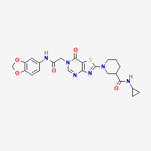 molecular formula C23H24N6O5S B2870356 1-(6-(2-(benzo[d][1,3]dioxol-5-ylamino)-2-oxoethyl)-7-oxo-6,7-dihydrothiazolo[4,5-d]pyrimidin-2-yl)-N-cyclopropylpiperidine-3-carboxamide CAS No. 1116081-75-4