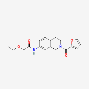 molecular formula C18H20N2O4 B2870829 2-ethoxy-N-(2-(furan-2-carbonyl)-1,2,3,4-tetrahydroisoquinolin-7-yl)acetamide CAS No. 955685-87-7
