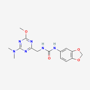 molecular formula C15H18N6O4 B2871157 1-(Benzo[d][1,3]dioxol-5-yl)-3-((4-(dimethylamino)-6-methoxy-1,3,5-triazin-2-yl)methyl)urea CAS No. 2034540-23-1