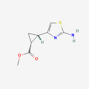 Methyl (1R,2S)-2-(2-amino-1,3-thiazol-4-yl)cyclopropane-1-carboxylate