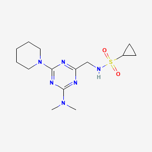 molecular formula C14H24N6O2S B2871478 N-((4-(dimethylamino)-6-(piperidin-1-yl)-1,3,5-triazin-2-yl)methyl)cyclopropanesulfonamide CAS No. 2034550-41-7