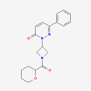 molecular formula C19H21N3O3 B2872026 2-[1-(Oxane-2-carbonyl)azetidin-3-yl]-6-phenylpyridazin-3-one CAS No. 2380077-95-0