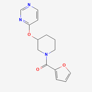 molecular formula C14H15N3O3 B2872113 Furan-2-yl(3-(pyrimidin-4-yloxy)piperidin-1-yl)methanone CAS No. 2034332-08-4