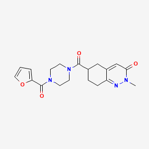 molecular formula C19H22N4O4 B2874690 6-(4-(呋喃-2-羰基)哌嗪-1-羰基)-2-甲基-5,6,7,8-四氢苯并环辛-3(2H)-酮 CAS No. 2034444-83-0