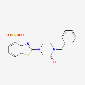 molecular formula C19H19N3O3S2 B2877726 1-Benzyl-4-(4-methanesulfonyl-1,3-benzothiazol-2-yl)piperazin-2-one CAS No. 2415462-53-0