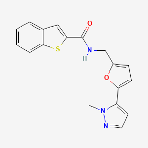 molecular formula C18H15N3O2S B2878463 N-[[5-(2-Methylpyrazol-3-yl)furan-2-yl]methyl]-1-benzothiophene-2-carboxamide CAS No. 2415563-75-4