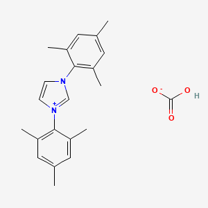 molecular formula C22H26N2O3 B2878639 1,3-Bis(2,4,6-trimethylphenyl)imidazolium bicarbonate CAS No. 1372124-93-0