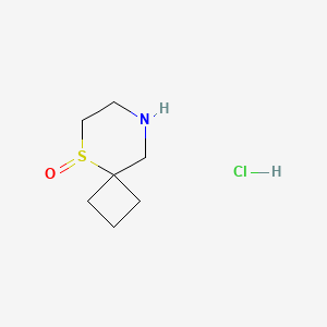 molecular formula C7H14ClNOS B2878948 5lambda4-噻-8-氮杂螺[3.5]壬烷 5-氧化物；盐酸盐 CAS No. 2503204-13-3