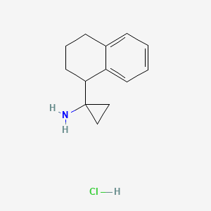 molecular formula C13H18ClN B2878997 1-(1,2,3,4-四氢萘-1-基)环丙-1-胺盐酸盐 CAS No. 2172495-64-4