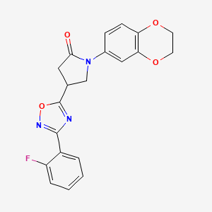 molecular formula C20H16FN3O4 B2879568 1-(2,3-Dihydro-1,4-benzodioxin-6-yl)-4-[3-(2-fluorophenyl)-1,2,4-oxadiazol-5-yl]-2-pyrrolidinone CAS No. 941893-44-3