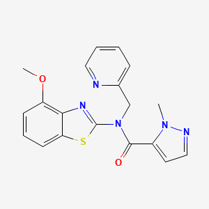 B2879863 N-(4-methoxybenzo[d]thiazol-2-yl)-1-methyl-N-(pyridin-2-ylmethyl)-1H-pyrazole-5-carboxamide CAS No. 1209717-14-5