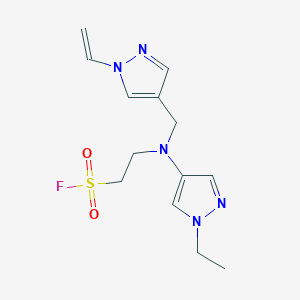 molecular formula C13H18FN5O2S B2879965 2-[(1-Ethenylpyrazol-4-yl)methyl-(1-ethylpyrazol-4-yl)amino]ethanesulfonyl fluoride CAS No. 2411268-17-0