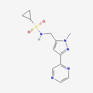 molecular formula C12H15N5O2S B2880616 N-((1-methyl-3-(pyrazin-2-yl)-1H-pyrazol-5-yl)methyl)cyclopropanesulfonamide CAS No. 2034509-09-4