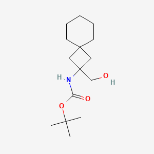 molecular formula C15H27NO3 B2881110 叔丁基 N-[2-(羟甲基)螺[3.5]壬烷-2-基]氨基甲酸酯 CAS No. 2408976-00-9