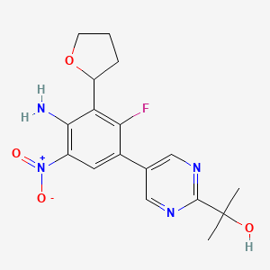 molecular formula C17H19FN4O4 B2885076 2-{5-[4-Amino-2-fluoro-5-nitro-3-(oxolan-2-yl)phenyl]pyrimidin-2-yl}propan-2-ol CAS No. 1384984-28-4