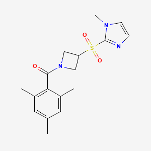molecular formula C17H21N3O3S B2885118 mesityl(3-((1-methyl-1H-imidazol-2-yl)sulfonyl)azetidin-1-yl)methanone CAS No. 2310160-92-8
