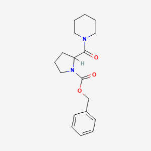 molecular formula C18H24N2O3 B2885527 苄基 2-(哌啶-1-羰基)吡咯烷-1-羧酸盐 CAS No. 1786119-30-9