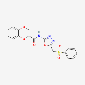 molecular formula C18H15N3O6S B2885660 N-(5-((phenylsulfonyl)methyl)-1,3,4-oxadiazol-2-yl)-2,3-dihydrobenzo[b][1,4]dioxine-2-carboxamide CAS No. 923482-77-3