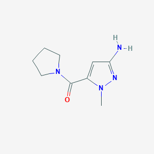 molecular formula C9H14N4O B2885714 3-Amino-1-methylpyrazol-5-yl pyrrolidinyl ketone CAS No. 1174852-89-1
