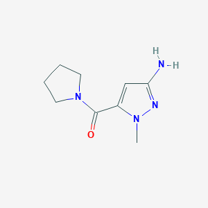 B2885714 3-Amino-1-methylpyrazol-5-yl pyrrolidinyl ketone CAS No. 1174852-89-1