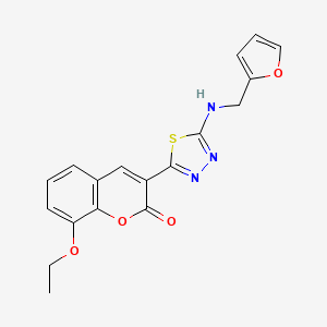 molecular formula C18H15N3O4S B2887157 8-Ethoxy-3-[5-(furan-2-ylmethylamino)-1,3,4-thiadiazol-2-yl]chromen-2-one CAS No. 690215-56-6