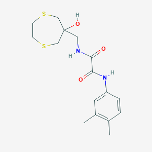 molecular formula C16H22N2O3S2 B2887245 N'-(3,4-Dimethylphenyl)-N-[(6-hydroxy-1,4-dithiepan-6-yl)methyl]oxamide CAS No. 2415601-50-0