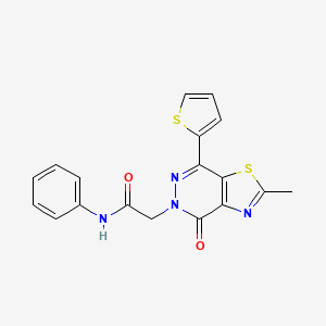 molecular formula C18H14N4O2S2 B2888619 2-(2-methyl-4-oxo-7-(thiophen-2-yl)thiazolo[4,5-d]pyridazin-5(4H)-yl)-N-phenylacetamide CAS No. 942004-43-5