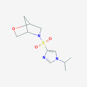 molecular formula C11H17N3O3S B2889090 5-((1-isopropyl-1H-imidazol-4-yl)sulfonyl)-2-oxa-5-azabicyclo[2.2.1]heptane CAS No. 2034613-09-5