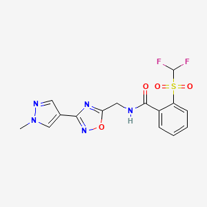 molecular formula C15H13F2N5O4S B2889224 2-((difluoromethyl)sulfonyl)-N-((3-(1-methyl-1H-pyrazol-4-yl)-1,2,4-oxadiazol-5-yl)methyl)benzamide CAS No. 2034559-95-8