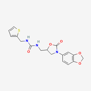 molecular formula C17H17N3O5S B2889415 1-((3-(Benzo[d][1,3]dioxol-5-yl)-2-oxooxazolidin-5-yl)methyl)-3-(thiophen-2-ylmethyl)urea CAS No. 954691-78-2