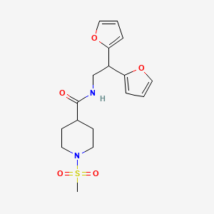 molecular formula C17H22N2O5S B2889774 N-[2,2-Bis(furan-2-yl)ethyl]-1-methylsulfonylpiperidine-4-carboxamide CAS No. 2415562-82-0