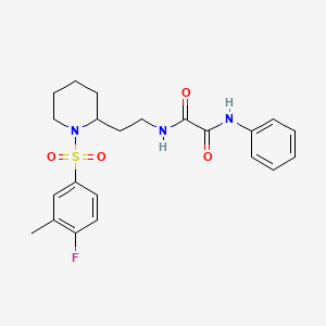 molecular formula C22H26FN3O4S B2889984 N1-(2-(1-((4-fluoro-3-methylphenyl)sulfonyl)piperidin-2-yl)ethyl)-N2-phenyloxalamide CAS No. 898406-90-1